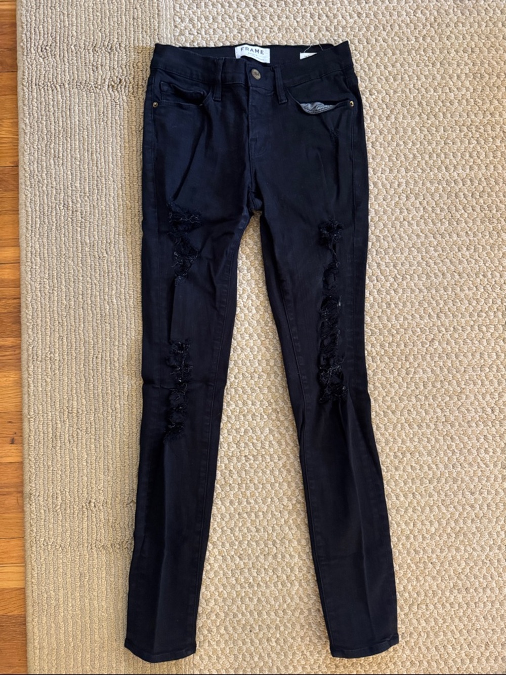 Frame Denim Women’s Skinny Jeans in Black with Distressed Detail